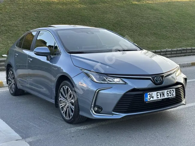 سيارة Toyota Corolla 1,8 Hybrid Flame X موديل 2021 - حزمة كاملة بمسافة 112000 كم