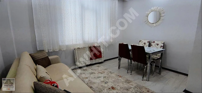 1+1 apartment with an elevator on the middle floor, suitable for obtaining a loan from BİNEVLER GAYRİMENKUL.