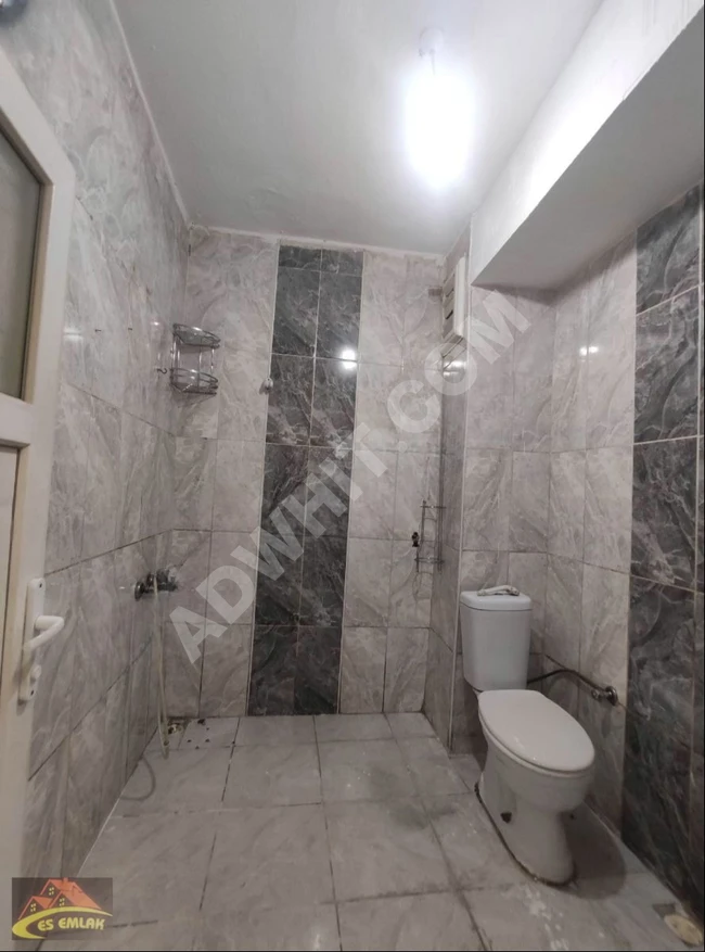 1+1 apartment for sale on the ground floor in İkitelli Mehmet Akif