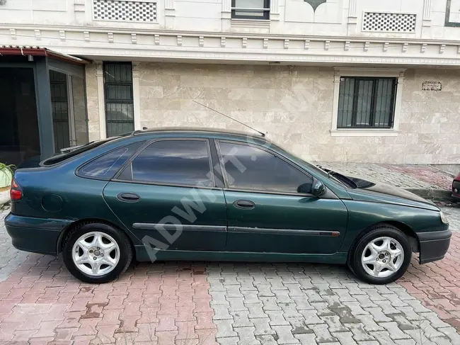 Renault Laguna/1.9RXE موديل 1999 مع إمكانية التقسيط بالسندات  أو الدفع عبر بطقة الإئتمان