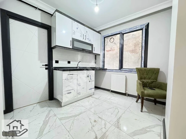 1+1 apartment by Enes with a high entrance for sale in Fevziçakmak neighborhood, 70 m², new.