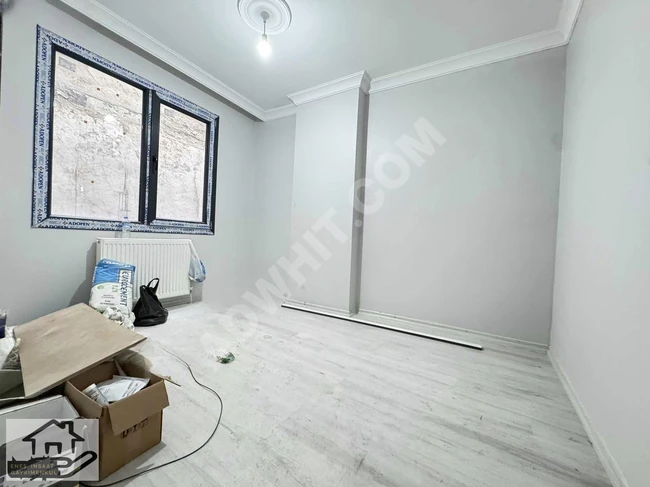 1+1 apartment by Enes with a high entrance for sale in Fevziçakmak neighborhood, 70 m², new.