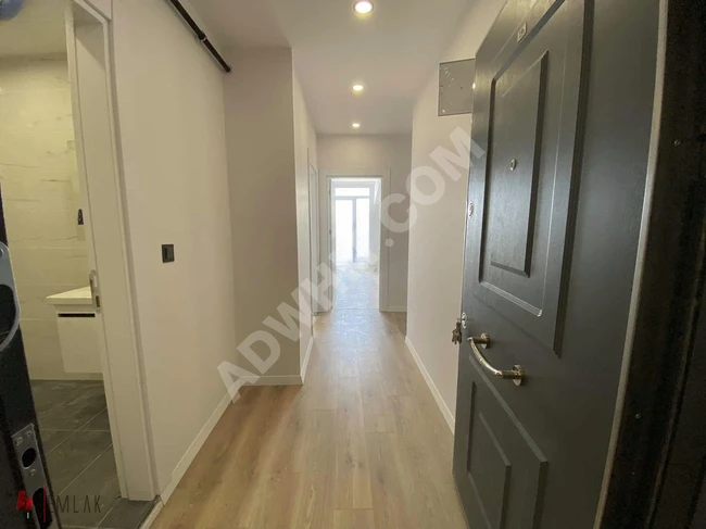 New 2+1 apartment for rent with a total area of 110 square meters, balcony, and American kitchen in BEYLİKDÜZÜ YAKUPLU.