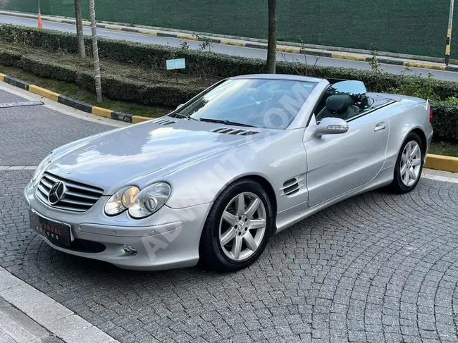 سيارة MERCEDES-BENZ SLK موديل 2002 من الوكيل بمسافة 126.000 كم