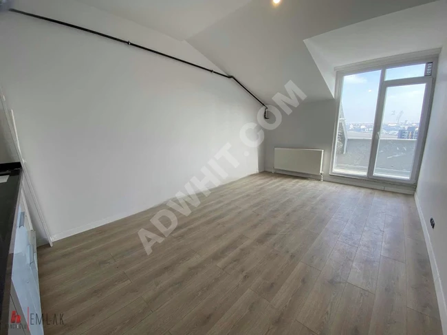 New 2+1 apartment for rent with a total area of 110 square meters, balcony, and American kitchen in BEYLİKDÜZÜ YAKUPLU.