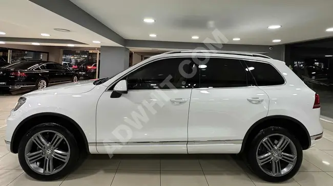 سيارة TOUAREG 3.0 TDI PREMİUM AİRMATİC-R LİNE JANT موديل 2015 - نظام ملاحة - بدون طلاء