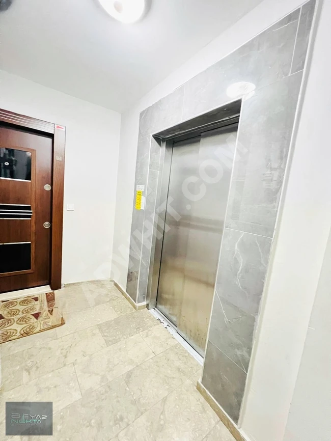 2+1 apartment on the second floor with an elevator on SEZAİ KARAKOÇ Street from BEYAZNOKTA