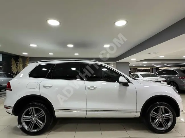 سيارة TOUAREG 3.0 TDI PREMİUM AİRMATİC-R LİNE JANT موديل 2015 - نظام ملاحة - بدون طلاء