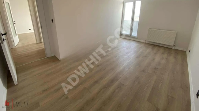 New 2+1 apartment for rent with a total area of 110 square meters, balcony, and American kitchen in BEYLİKDÜZÜ YAKUPLU.