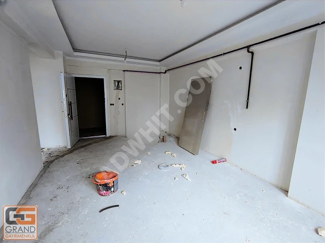 1+1 apartment in a great location in TUZLA AYDINLI