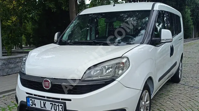 FIAT DOBLO 1*3 MULTIJET 2015 model minivan with 90 horsepower and 301,000 kilometers.