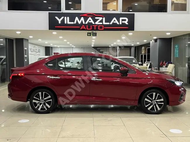 سيارة Honda City موديل 2022 بلا خطأ بمسافة 41 ألف كم لون احمر -** 1,79 قرض