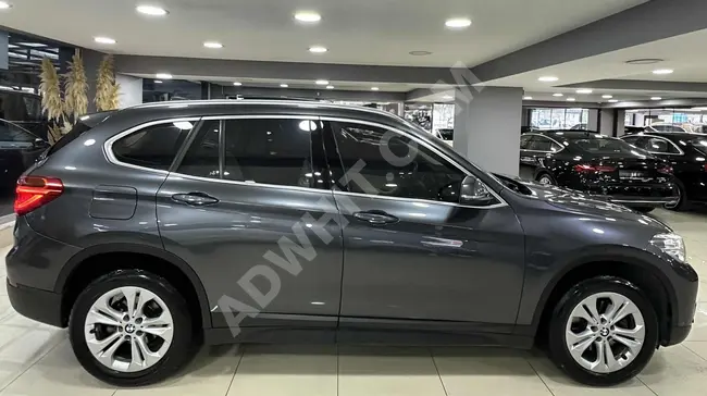 BMW X1 18i موديل 2016 بدون عيوب كاميرا رؤية خلفية - سقف بانورامي - حقيبة امتعة الكترونية - 50.000 كم