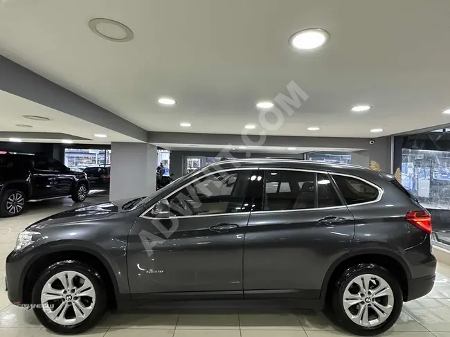 BMW X1 18i موديل 2016 بدون عيوب كاميرا رؤية خلفية - سقف بانورامي - حقيبة امتعة الكترونية - 50.000 كم