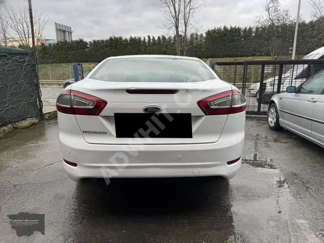 FORD MONDEO 2.0 PWS with a down payment of 200,000 in cash and deferred bonds