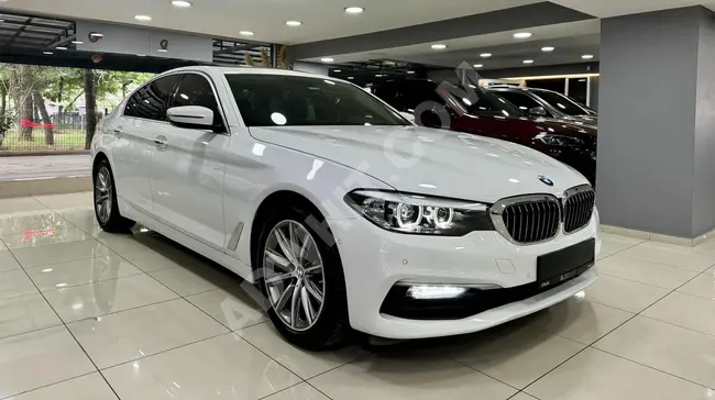 BMW 5.20i 1.6 model 2017 with rearview camera, smart key, 18-inch rim, dual air conditioning.