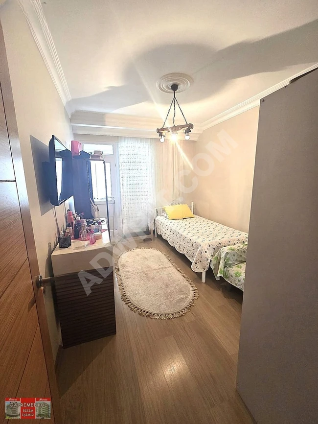 A 2+1 apartment with an area of 110 square meters in a 10-year-old building for sale in Gümüşpala, suitable for a mortgage.