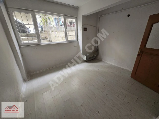 For rent: 1+1 apartment on the ground floor with a garden in İkitelli Mehmet Akif Neighborhood.