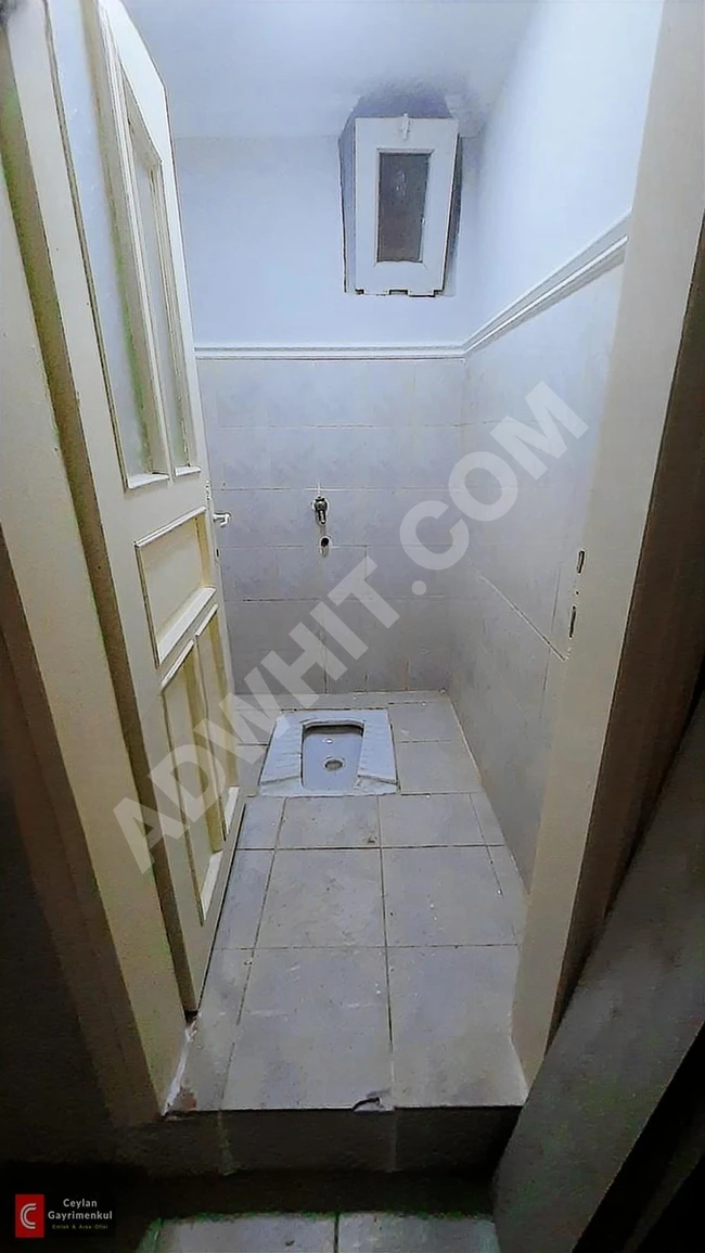 2+1 apartment with a net area of 105 m² in a 17-year-old building in Koca Sinan Merkezi Mahallesi, available for purchase via loan.