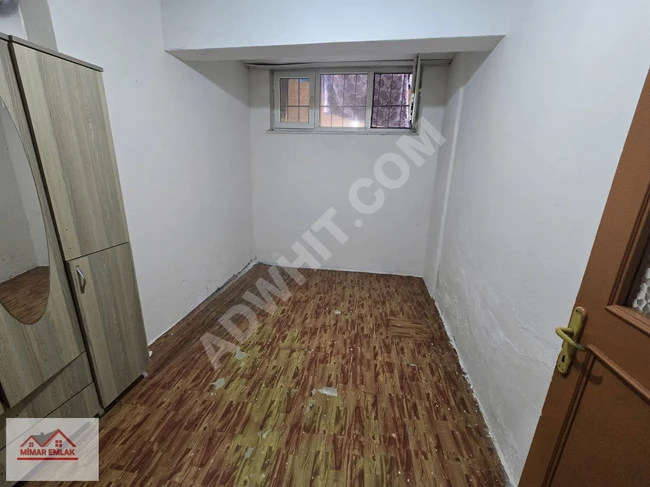 For rent: 1+1 apartment on the ground floor with a garden in İkitelli Mehmet Akif Neighborhood.