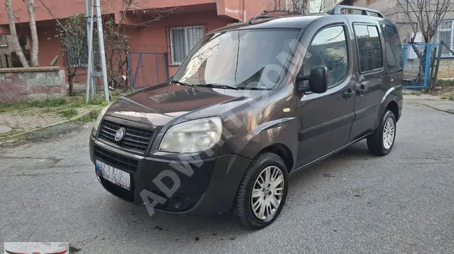 ميني فان Fiat Doblo 1.3 MULTIJET موديل 2012 - مزدوجة الابواب المنزلقة - مكيفة