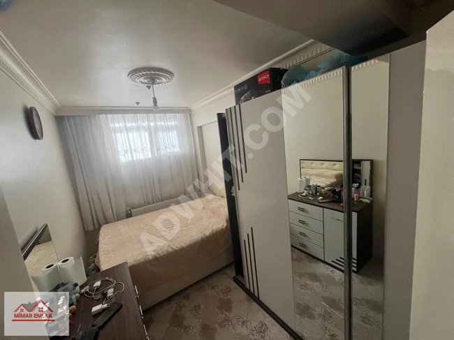 A 2+1 apartment on the ground floor in MEHMET AKİF by MİMAR EMLAK, eligible for a loan.