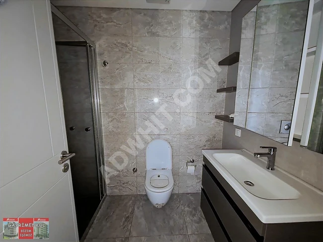 1+1 apartment for rent in Semt Bahçekent D Block, painted and clean