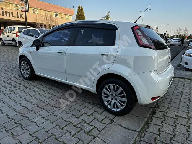 FIAT PUNTO 1.3 MJT POP Model 2013 with authorized service maintenance.