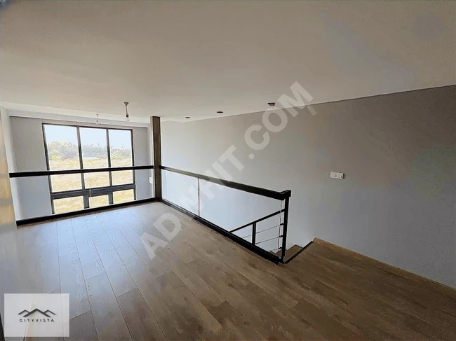 A 1+1 loft apartment with a sea view for rent in Beylikdüzü In Mari