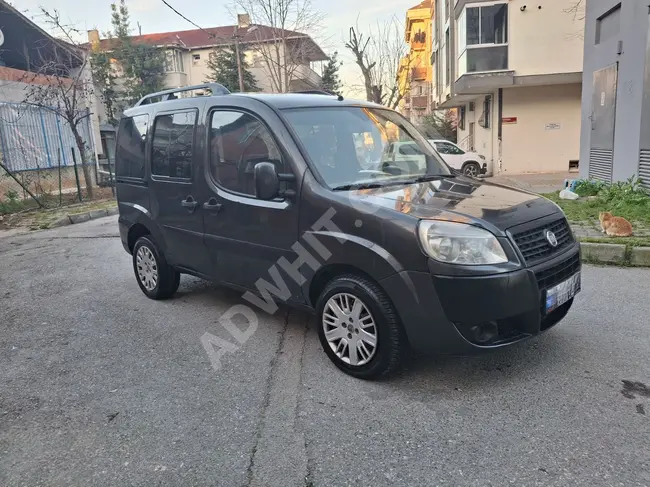 ميني فان Fiat Doblo 1.3 MULTIJET موديل 2012 - مزدوجة الابواب المنزلقة - مكيفة