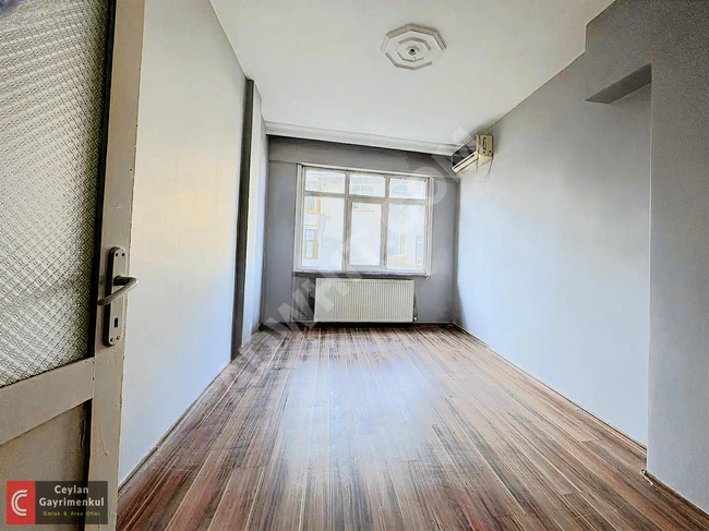 2+1 apartment for sale on a middle floor near the Soğanlı Central Mosque, eligible for a loan.