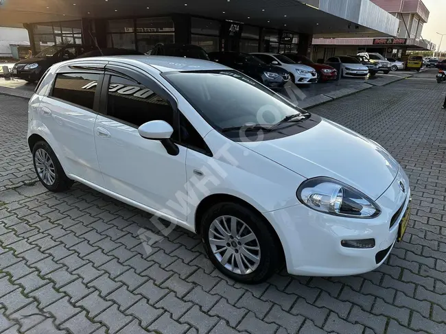 FIAT PUNTO 1.3 MJT POP Model 2013 with authorized service maintenance.