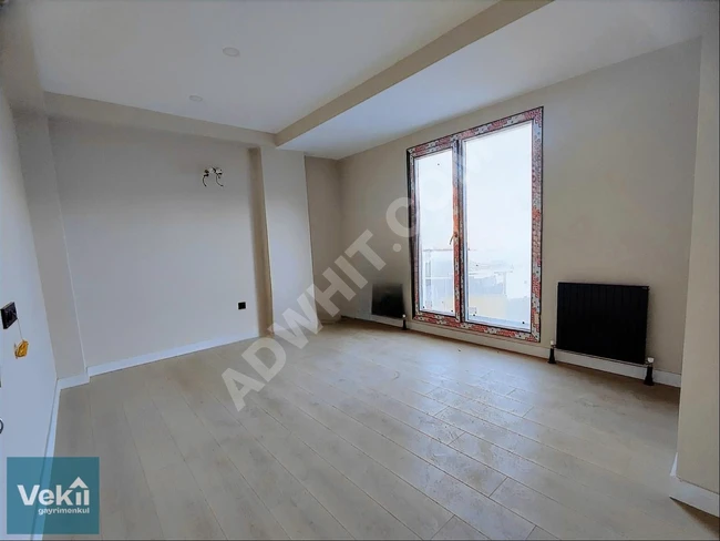 2+1 empty apartment for sale with a new front in GALLERIA RESIDENCE