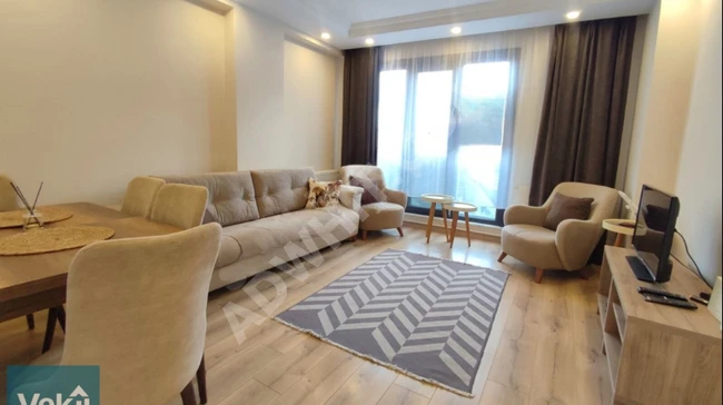 Apartment for rent in a modern building with an elevator on a middle floor, fully furnished.