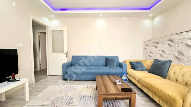 An 85 square meter apartment consisting of two rooms and a living room on the fifth floor with an elevator in a building that is 9 years old on ÇAMLIK Street.