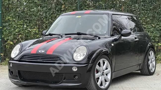 MINI One with automatic transmission featuring a glass roof, manual gearbox, low mileages, newly inspected.