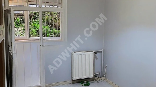 1+1 apartment on the ground floor near the government hospital in Zuhuratbaba.