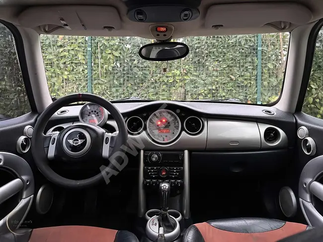 MINI One with automatic transmission featuring a glass roof, manual gearbox, low mileages, newly inspected.