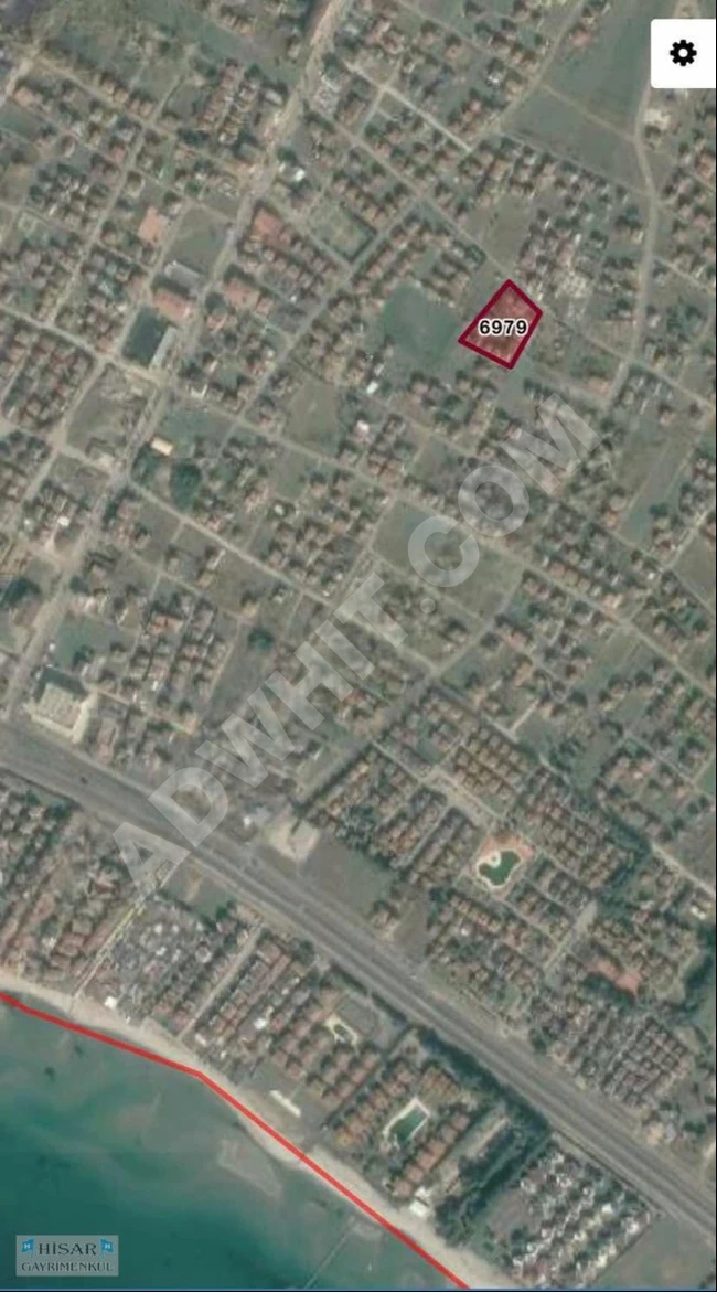 A plot of land for sale with an area of 150 square meters in YENİÇİFTLİK