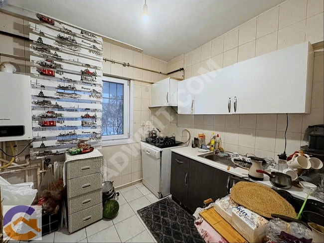 Opportunity: Apartment in the PETROL İŞ neighborhood, ground floor, with an open parking area.