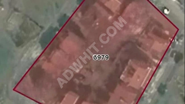 A plot of land for sale with an area of 150 square meters in YENİÇİFTLİK