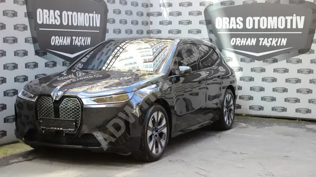 BMW İX FİRS EDİTİON -  موديل 2022 - بدون طلاء  25,000 كم - من اوراس للسيارات