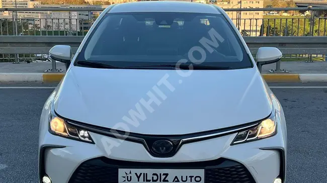 سيارة Corolla 1.8 Hybrid أوتوماتيك - صيانة معتمدة من الوكيل