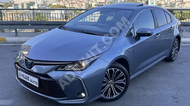 سيارة Corolla 1.8 Hybrid Flame X-Pack موديل 2021 - فتحة سقف - تنبيه انحراف المسار - نظام منع التصادم