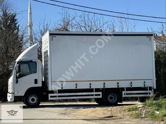 ISUZU NPR 8 LONG خروج 2012 بدون عيوب 175 ألف بصندوق جديد