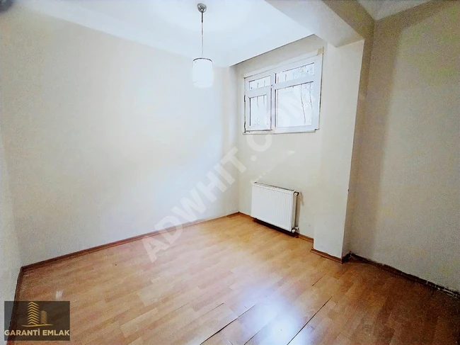 Unique 2+1 apartment with an area of 90 square meters in the center of SEFAKÖY with a garden on the top floor