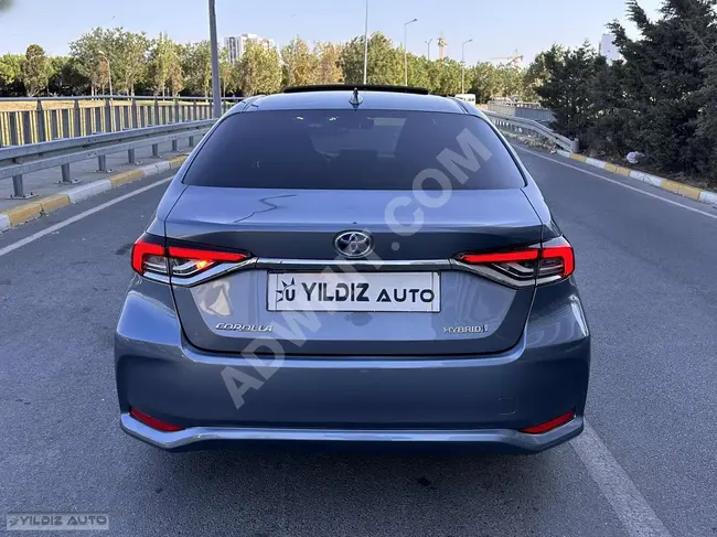 سيارة Corolla 1.8 Hybrid Flame X-Pack موديل 2021 - فتحة سقف - تنبيه انحراف المسار - نظام منع التصادم