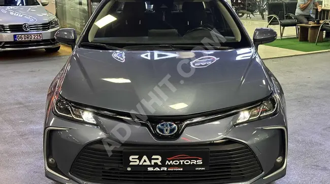 سيارة COROLLA 1.8 HYBRID DREAM بمسافة 132000 كم مع شاشة عرض - 1.79 قرض