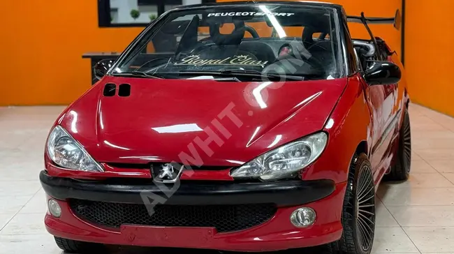 Peugeot 206 بلون احمر الذي يفوت فرصة السنة سيأسف بشدة