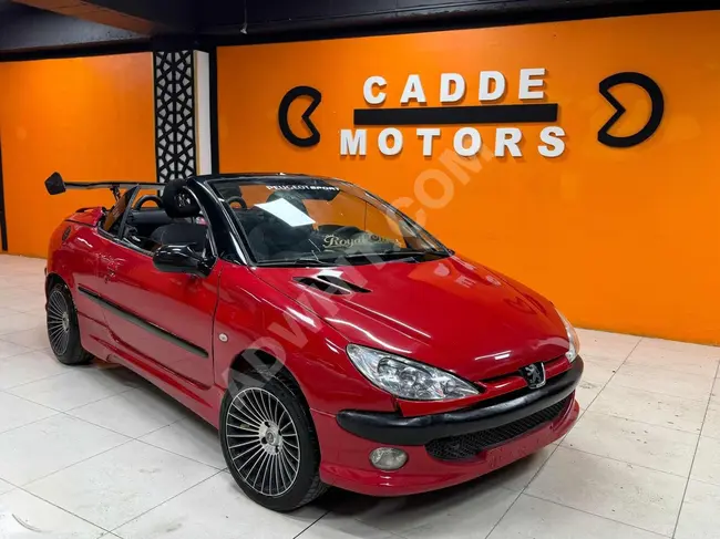 Peugeot 206 بلون احمر الذي يفوت فرصة السنة سيأسف بشدة